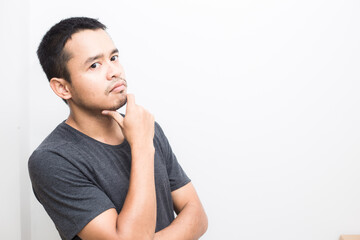 Business young asian man wear t shirt showing hand with facial face