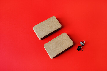 Kraft business cards on red