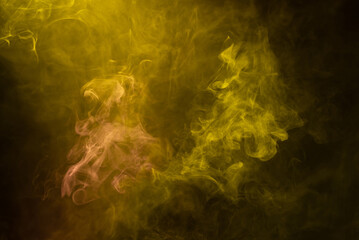 Yellow and pink steam on a black background.