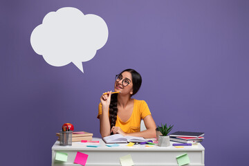 Smiling indian woman looking up at speech bubble