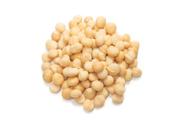 Macadamia nuts isolated on white background.