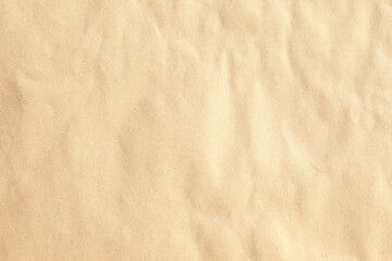 Fototapeta na wymiar Crumpled brown kraft paper texture