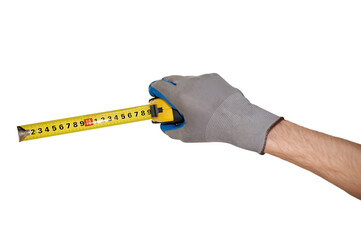 A man's gloved hand holds a tape measure a centimeter