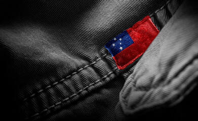Tag on dark clothing in the form of the flag of the Samoa