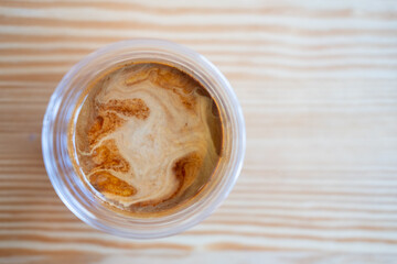 A cup of dirty latte before drink