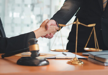 Businessman shaking hands to seal a deal with his partner