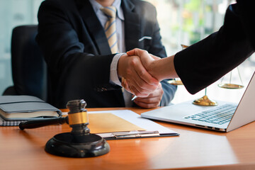 Businessman shaking hands to seal a deal with his partner