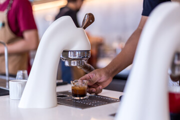 Obraz na płótnie Canvas Flair espresso machine in a coffee shop with barista.