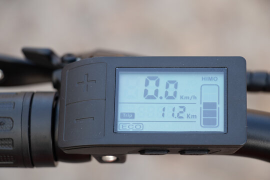 Ukraine Dnipro 30.03.2021 - Xiaomi HIMO C26 electric bike with camera pro 9 on the handlebars in the forest in spring, eco