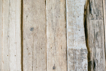 Film photography with noise: Old wood floor close-up, background in the form of old wood planks.