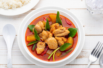 Chicken curry, without coconut milk, with winter melon, a simple savory dish in Isan Thai food style often including lemon basil to enhance flavor and aroma.