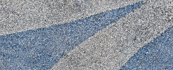 Rubber floor texture background. EPDM playground surface. Blue background.