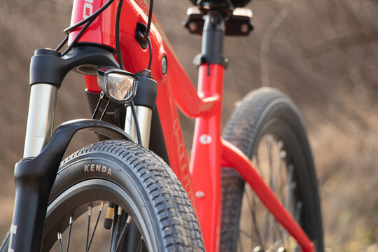 Ukraine Dnipro 30.03.2021 - Xiaomi HIMO C26 electric bike with camera pro 9 on the handlebars in the forest in spring, eco