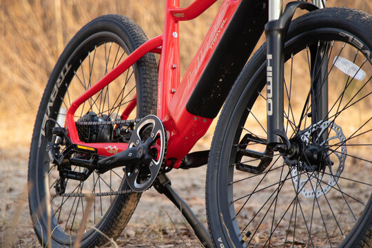 Ukraine Dnipro 30.03.2021 - Xiaomi HIMO C26 electric bike with camera pro 9 on the handlebars in the forest in spring, eco