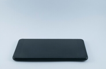 Obraz na płótnie Canvas Perspective side view of black screen smartphone.