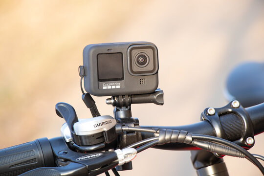 Ukraine Dnipro 30.03.2021 - Xiaomi HIMO C26 electric bike with camera pro 9 on the handlebars in the forest in spring, eco