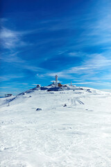 Empty ski chair lift on a mountain - season with no tourists.
