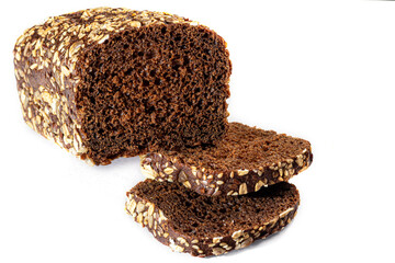 Homebaked bread. Gluten-free cereal with seeds and sesame seeds. Dark background.