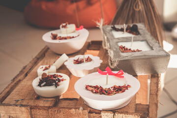 Scented candles of different flavor, to decorate your home, bathroom, party table.  
