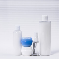 Plastic containers without labels for brand advertising on a white background. 