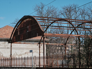 old slaughterhouse structure with rusty iron decorations (EX MACELLO MONZA) italy, lombardy.