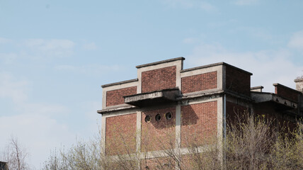 old abandoned factory with broken glass industrial window decay abandoned structure Varedo, Monza Brianza, Lombardy Italy.