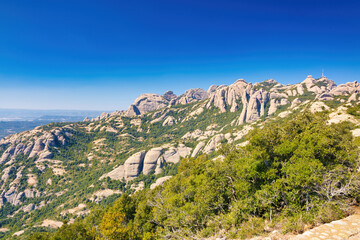 View from the viewpoint of the Sierra Paparres of different peaks that make up the Natural Park of the Montserrat massif, Catalonia, Spain
