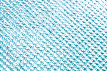 abstract light blue curly glass background, tinted, soft focus