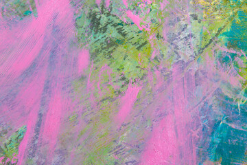 colorful creative motley background: smudged residues of oil paints on a wooden palette, short focus, selective blur