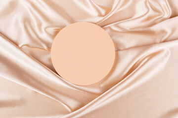 Geometric platform podium on pastel silk satin background. Blank cylinder form mock up background...