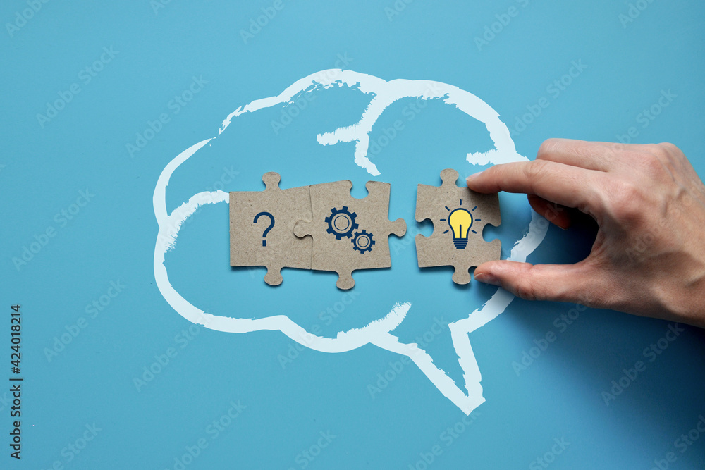 Poster brain silhouette and puzzles with drawings of the question, gear and answer. the symbol of a difficu