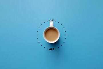 A cup of coffee and a switch. The symbol of the beginning of the day. Turn on good morning