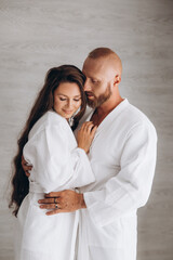 Couple is relaxing in a hotel room. Rest for lovers. 