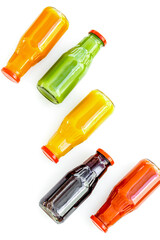 vegetable and fruit juice in bottles for diet drink on white background top view mock up
