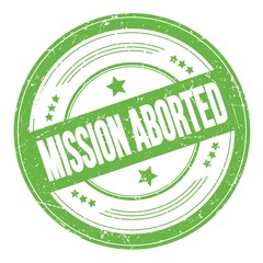 MISSION ABORTED text on green round grungy stamp.