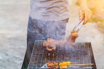 Blurred images , A group of colleagues held a barbecue party. (BBQ) inside the villa after work to...