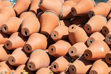 Traditional ceramic pots for catching octopus in Punta Umbria harbor, Huelva, Andalusia, Spain