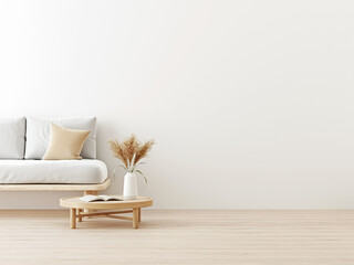 Interior wall mockup in warm neutrals with low sofa, beige pillow and dried Pampas grass on caned table in japandi style living room with empty white wall background. 3D rendering, illustration.