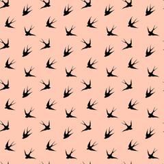 seamless pattern with graphic birds swallows on pink background