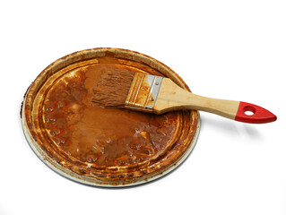 used brush on bucket lid isolated on white background