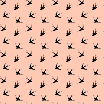 seamless pattern with graphic birds swallows on pink background