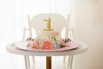 Birthday cake on a chair for the special little baby girl