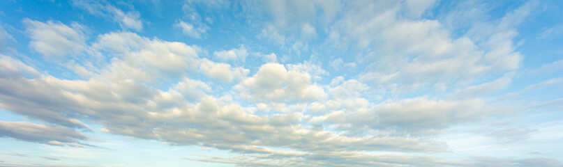 Naklejka na ściany i meble blue sky background with tiny clouds. panorama