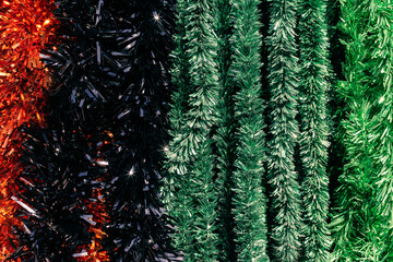 Colorful shining tinsel garland background. Colorful background.