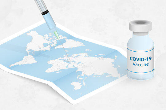 Vaccine and syringe in the world map. Coronavirus vaccine.