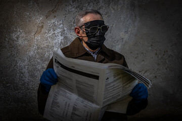 An old man,protesting against the Corona repression wearing several masks on his face