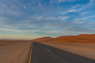 Fototapeta na wymiar Road to Sossusvlei at the morning time, background dunes, Namib desert, Namibia