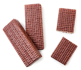 Waffles in chocolate whole and half set on white background, isolated. Top view