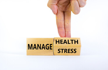 Manage stress and be health symbol. Doctor turns a cube and changes words 'manage stress' to 'manage health'. Beautiful white background. Psychological, business and manage stress concept. Copy space.
