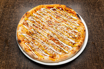 pizza on the wooden background
